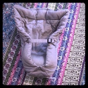 Grey newborn inset for a baby bjorn baby holder